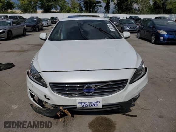 2014 Volvo S60 T5 с VIN YV1612FS6E1295211, выставлен на аукционе Copart как лот 68527425 с пробегом Не указан миль и Списание • Salvage title. История ставок и продаж доступна на DreamBid. Изображение 5.