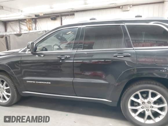 2015 Jeep Grand Cherokee Summit с VIN 1C4RJFJM6FC775709, выставлен на аукционе IAAI как лот 42818098 с пробегом 104 979 миль миль и . История ставок и продаж доступна на DreamBid. Изображение 14.