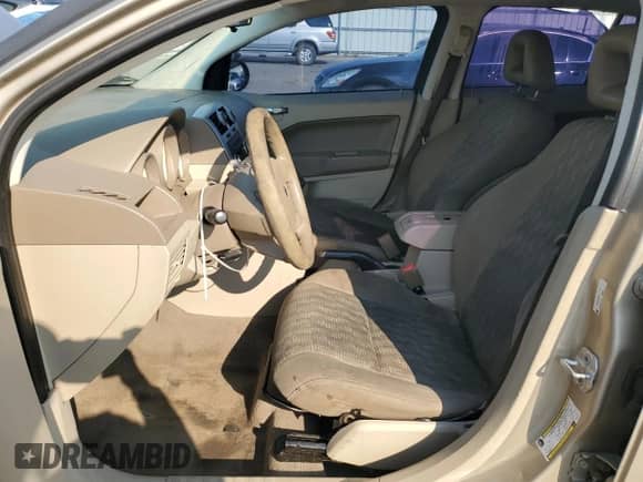 2009 Dodge Caliber SE with VIN 1B3HB28A99D151772, listed as a Copart auction lot 66681595 with 189,648 mi miles and Salvage title. Bid and sale history available at DreamBid. Image 7.
