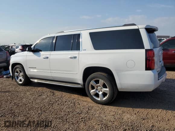 2015 Chevrolet Suburban LTZ с VIN 1GNSKKKC9FR519338, выставлен на аукционе Copart как лот 71203375 с пробегом 135 043 миль миль и Чистый • Clean title. История ставок и продаж доступна на DreamBid. Изображение 2.
