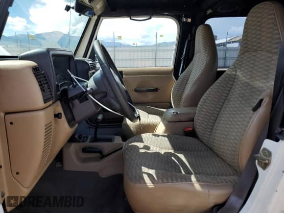 2000 Jeep Wrangler Sport z VIN 1J4FA49SXYP700513, wystawiony jako Copart lot #80155385 z przebiegiem 129 836 mil mil oraz Szkoda całkowita • Salvage title. Historia ofert i sprzedaży dostępna na DreamBid. Obrazek 7.