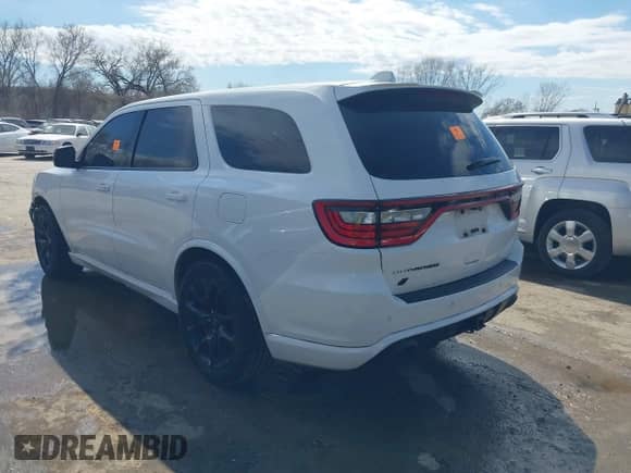 2021 Dodge Durango SRT Hellcat with VIN 1C4SDJH96MC762632, listed as a IAAI auction lot 41664693 with 29,236 mi miles and . Bid and sale history available at DreamBid. Image 3.