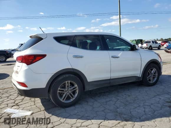 2018 Hyundai Santa Fe 2.4L с VIN 5NMZT3LB5JH083021, выставлен на аукционе Copart как лот 85673175 с пробегом 124 646 миль миль и Списание • Salvage title. История ставок и продаж доступна на DreamBid. Изображение 3.