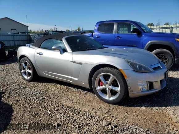 2009 Saturn Sky Red Line с VIN 1G8MT35X59Y104413, выставлен на аукционе Copart как лот 84166785 с пробегом 82 261 миль миль и Списание • Salvage title. История ставок и продаж доступна на DreamBid. Изображение 4.