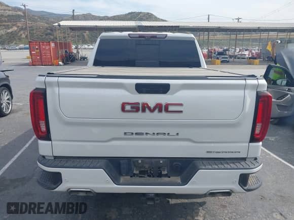 2021 GMC Sierra 1500 Denali with VIN 3GTU9FEL1MG349215, listed as a IAAI auction lot 42268438 with 97,465 mi miles and . Bid and sale history available at DreamBid. Image 16.