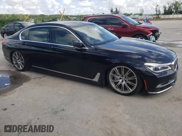 2018 BMW 7 Series 750i с VIN WBA7F0C52JGM24063, выставлен на аукционе Copart как лот 65798794 с пробегом 89 924 миль миль и Чистый • Clean title. История ставок и продаж доступна на DreamBid. Изображение 4.