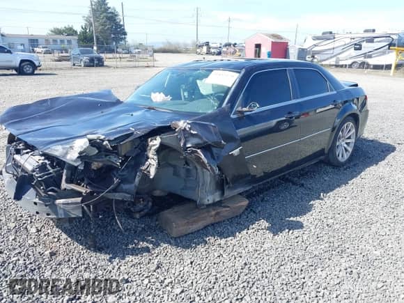 2006 Chrysler 300 C SRT-8 with VIN 2C3LA73W36H509656, listed as a IAAI auction lot 41852179 with 92,209 mi miles and . Bid and sale history available at DreamBid. Image 2.