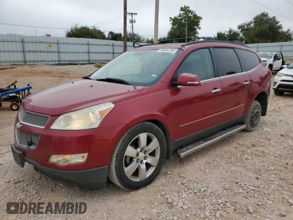 2012 Chevrolet Traverse LTZ with VIN 1GNKRLED3CJ131831, listed as a Copart auction lot 84834755 with 209,685 mi miles and Salvage title. Bid and sale history available at DreamBid. Image 1.