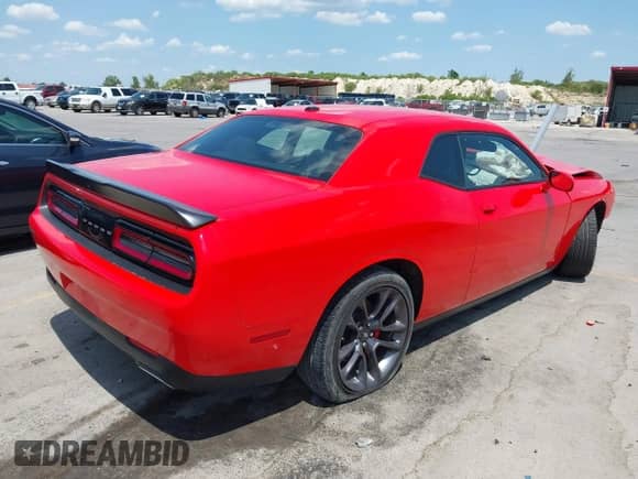 2023 Dodge Challenger GT с VIN 2C3CDZJG8PH590962, выставлен на аукционе IAAI как лот 43016573 с пробегом 14 801 миль миль и . История ставок и продаж доступна на DreamBid. Изображение 4.