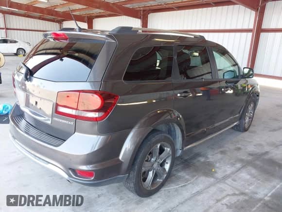 2017 Dodge Journey Crossroad Plus with VIN 3C4PDDGG0HT563092, listed as a IAAI auction lot 42432409 with 148,358 mi miles and . Bid and sale history available at DreamBid. Image 4.