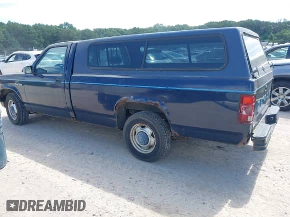 1993 Dodge Dakota S with VIN 1B7GL26X6PS235197, listed as a IAAI auction lot 43067013 with 111,915 mi miles and . Bid and sale history available at DreamBid. Image 3.
