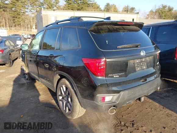 2022 Honda Passport EX-L with VIN 5FNYF8H5XNB020829, listed as a IAAI auction lot 41757349 with 20,456 mi miles and . Bid and sale history available at DreamBid. Image 3.