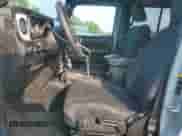 2024 Jeep Wrangler Sport S with VIN 1C4PJXDG6RW257105, listed as a Copart auction lot 66905825 with 58,376 mi miles and Salvage title. Bid and sale history available at DreamBid. Image 7.