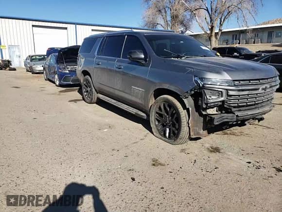 2022 Chevrolet Suburban Premier с VIN 1GNSKFKD6NR102953, выставлен на аукционе Copart как лот 43290145 с пробегом 75 274 миль миль и Списание • Salvage title. История ставок и продаж доступна на DreamBid. Изображение 11.