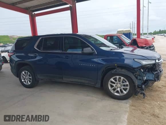 2023 Chevrolet Traverse LS z VIN 1GNERFKW0PJ287870, wystawiony jako IAAI lot #42647560 z przebiegiem 30 735 mil mil oraz . Historia ofert i sprzedaży dostępna na DreamBid. Obrazek 13.