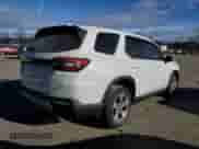 2024 Honda Pilot EX-L with VIN 5FNYG1H52RB049090, listed as a Copart auction lot 41562695 with 9,939 mi miles and Salvage title. Bid and sale history available at DreamBid. Image 3.