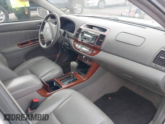 2005 Toyota Camry LE with VIN 4T1BF30K95U618598, listed as a IAAI auction lot 42912178 with 142,880 mi miles and . Bid and sale history available at DreamBid. Image 5.