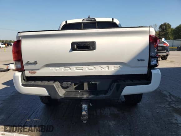 2023 Toyota Tacoma SR z VIN 3TMCZ5ANXPM645403, wystawiony jako Copart lot #84790665 z przebiegiem 81 279 mil mil oraz Szkoda całkowita • Salvage title. Historia ofert i sprzedaży dostępna na DreamBid. Obrazek 6.