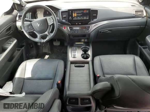 2023 Honda Passport EX-L with VIN 5FNYF8H5XPB018355, listed as a Copart auction lot 66667405 with 26,126 mi miles and Salvage title. Bid and sale history available at DreamBid. Image 8.
