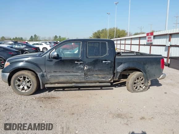 2019 Nissan Frontier SV with VIN 1N6AD0EVXKN735696, listed as a IAAI auction lot 41827835 with 81,488 mi miles and . Bid and sale history available at DreamBid. Image 14.