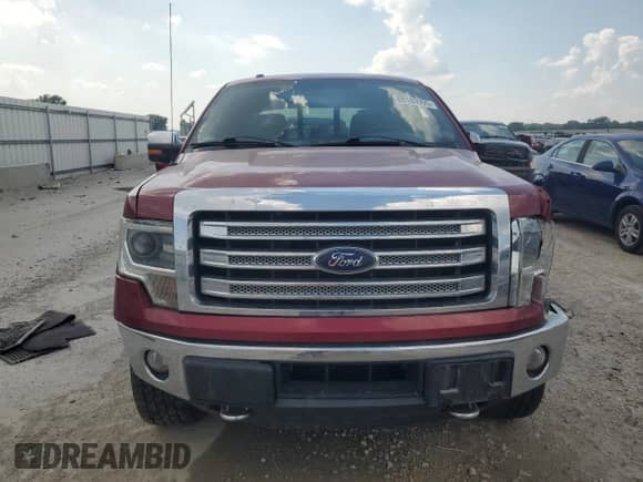 2013 Ford F-150 Lariat with VIN 1FTFW1ET7DKF18182, listed as a Copart auction lot 68183995 with 165,863 mi miles and Salvage title. Bid and sale history available at DreamBid. Image 5.