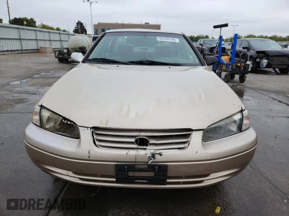 1997 Toyota Camry LE z VIN JT2BF22K5V0081756, wystawiony jako Copart lot #85339105 z przebiegiem 246 439 mil mil oraz Szkoda całkowita • Salvage title. Historia ofert i sprzedaży dostępna na DreamBid. Obrazek 5.