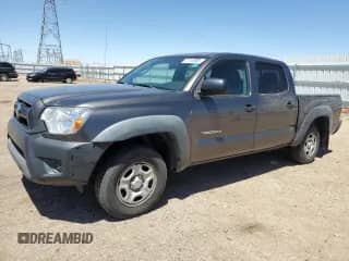 2012 Toyota Tacoma with VIN 5TFJX4CN1CX015875, listed as a Copart auction lot 57100965 with 292,514 mi miles and Salvage title. Bid and sale history available at DreamBid. Image 1.