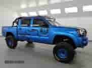 2005 Toyota Tacoma PreRunner with VIN 3TMJU62N05M002100, listed as a Copart auction lot 84837805 with 300,227 mi miles and Clean title. Bid and sale history available at DreamBid. Image 4.
