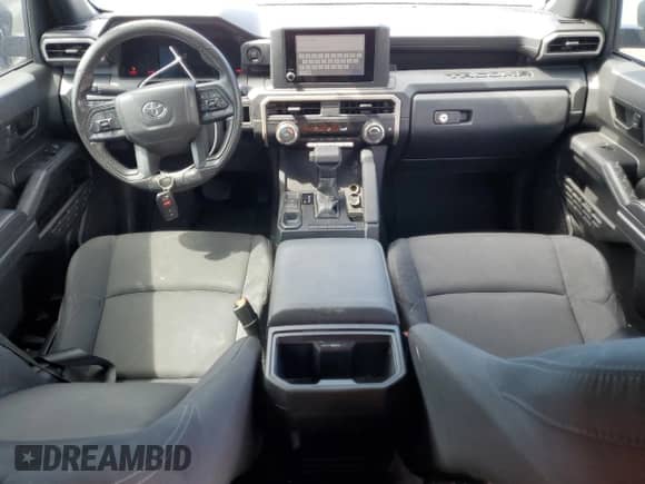 2024 Toyota Tacoma SR with VIN 3TYKD5HN7RT003129, listed as a Copart auction lot 63349125 with 15,244 mi miles and Salvage title. Bid and sale history available at DreamBid. Image 8.
