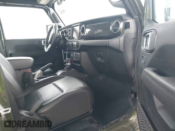 2022 Jeep Wrangler Unlimited Sahara with VIN 1C4HJXEN1NW262627, listed as a IAAI auction lot 42082719 with 22,051 mi miles and . Bid and sale history available at DreamBid. Image 5.