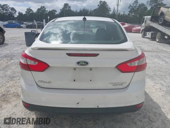 2013 Ford Focus Titanium with VIN 1FADP3J26DL112486, listed as a IAAI auction lot 43365520 with 223,173 mi miles and . Bid and sale history available at DreamBid. Image 16.