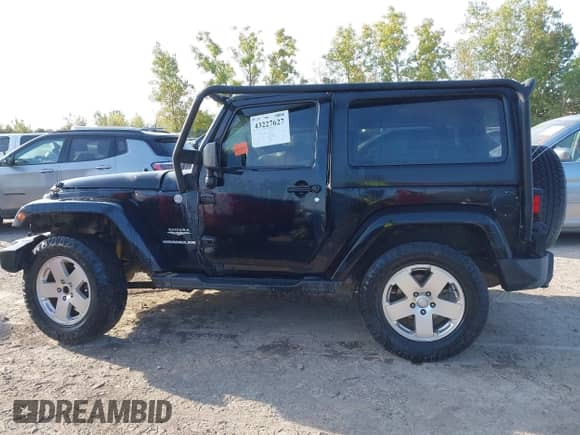 2011 Jeep Wrangler Sahara with VIN 1J4AA5D10BL511947, listed as a IAAI auction lot 43227627 with 168,984 mi miles and . Bid and sale history available at DreamBid. Image 13.