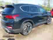 2019 Hyundai Santa Fe Ultimate с VIN 5NMS53AAXKH083541, выставлен на аукционе IAAI как лот 42081041 с пробегом 87 504 миль миль и . История ставок и продаж доступна на DreamBid. Изображение 4.