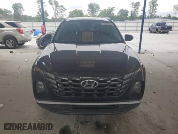 2022 Hyundai Tucson Blue with VIN KM8JBCA14NU018875, listed as a Copart auction lot 67028315 with 273,692 mi miles and Clean title. Bid and sale history available at DreamBid. Image 5.