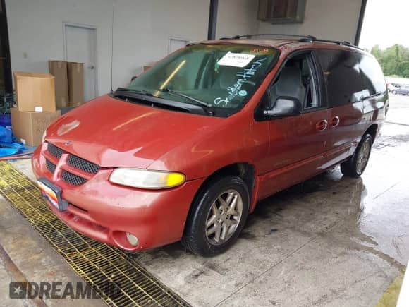 1999 Dodge Caravan SE with VIN 1B4GP44G6XB571061, listed as a IAAI auction lot 42878968 with Not provided miles and . Bid and sale history available at DreamBid. Image 2.