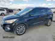 2017 Ford Escape Titanium with VIN 1FMCU0JDXHUE46871, listed as a Copart auction lot 84042315 with 89,103 mi miles and Salvage title. Bid and sale history available at DreamBid. Image 1.