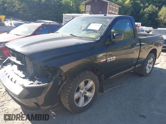 2014 Ram 1500 Express z VIN 3C6JR7AT0EG303916, wystawiony jako IAAI lot #43270828 z przebiegiem 149 254 mil mil oraz . Historia ofert i sprzedaży dostępna na DreamBid. Obrazek 17.