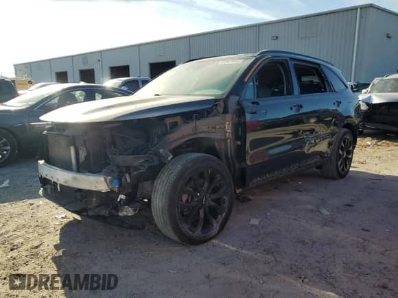 2022 Kia Sorento SX z VIN 5XYRK4LF9NG088198, wystawiony jako Copart lot #83983085 z przebiegiem 53 044 mil mil oraz Szkoda całkowita • Salvage title. Historia ofert i sprzedaży dostępna na DreamBid. Obrazek 1.