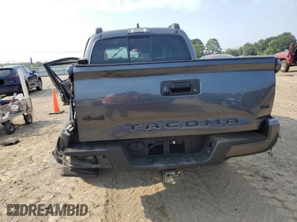 2022 Toyota Tacoma SR z VIN 3TMCZ5AN7NM518461, wystawiony jako Copart lot #69251985 z przebiegiem 46 634 mil mil oraz Szkoda całkowita • Salvage title. Historia ofert i sprzedaży dostępna na DreamBid. Obrazek 6.
