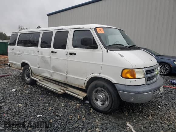 2000 Dodge Passenger with VIN 2B5WB35ZXYK166395, listed as a Copart auction lot 83293364 with 116,511 mi miles and Salvage title. Bid and sale history available at DreamBid. Image 4.