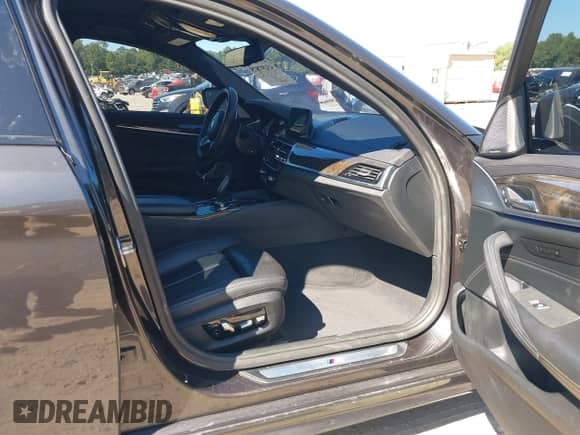 2017 BMW 5 Series 530i xDrive with VIN WBAJA7C35HG457970, listed as a IAAI auction lot 43197875 with 84,885 mi miles and . Bid and sale history available at DreamBid. Image 5.