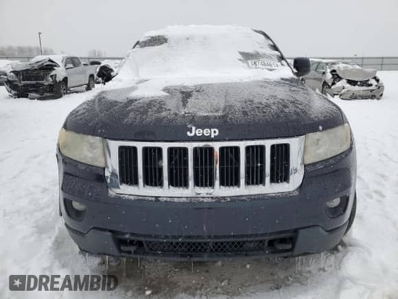 2011 Jeep Grand Cherokee 70th Anniversary z VIN 1J4RR4GT8BC534430, wystawiony jako Copart lot #87484614 z przebiegiem Nie podano mil oraz Szkoda całkowita • Salvage title. Historia ofert i sprzedaży dostępna na DreamBid. Obrazek 5.