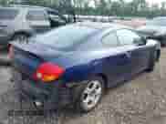 2003 Hyundai Tiburon with VIN KMHHM65D23U083655, listed as a IAAI auction lot 42923698 with Not provided miles and . Bid and sale history available at DreamBid. Image 4.