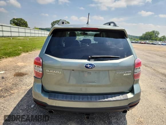 2014 Subaru Forester Premium with VIN JF2SJACC2EG487641, listed as a Copart auction lot 65424675 with 136,495 mi miles and Non repairable. Bid and sale history available at DreamBid. Image 6.