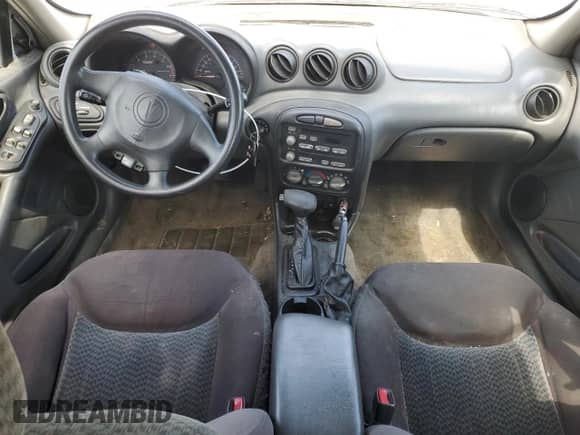 2004 Pontiac Grand Am SE1 with VIN 1G2NF52E54M686050, listed as a Copart auction lot 61688375 with 155,143 mi miles and Salvage title. Bid and sale history available at DreamBid. Image 8.