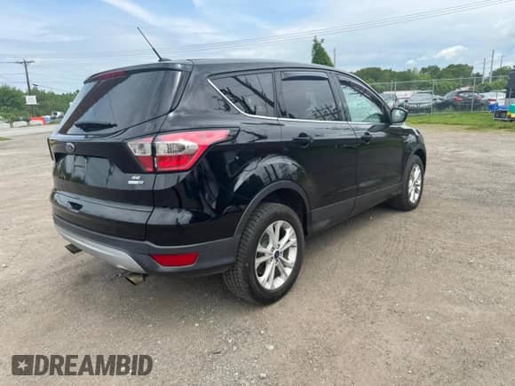 2017 Ford Escape SE с VIN 1FMCU9GD1HUE81634, выставлен на аукционе Copart как лот 59329635 с пробегом 98 326 миль миль и Чистый • Clean title. История ставок и продаж доступна на DreamBid. Изображение 4.