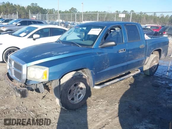 2005 Dodge Dakota SLT с VIN 1D7HE48K35S132981, выставлен на аукционе IAAI как лот 41475748 с пробегом 205 677 миль миль и . История ставок и продаж доступна на DreamBid. Изображение 17.