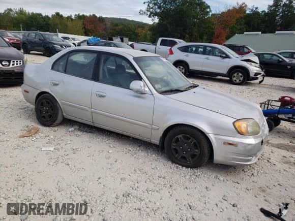 2005 Hyundai Accent GLS z VIN KMHCG45C25U603157, wystawiony jako Copart lot #71985824 z przebiegiem 110 124 mil mil oraz Czysty tytuł • Clean title. Historia ofert i sprzedaży dostępna na DreamBid. Obrazek 4.