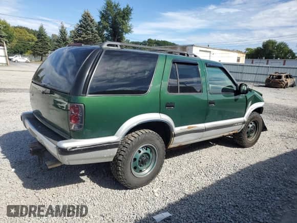 1997 Chevrolet Blazer LS with VIN 1GNDT13W2V2113031, listed as a Copart auction lot 80850575 with 158,759 mi miles and Salvage title. Bid and sale history available at DreamBid. Image 3.