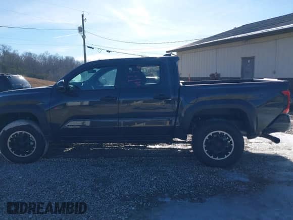 2024 Toyota Tacoma SR5 with VIN 3TYLB5JN6RT026356, listed as a IAAI auction lot 41432726 with 6,414 mi miles and . Bid and sale history available at DreamBid. Image 15.